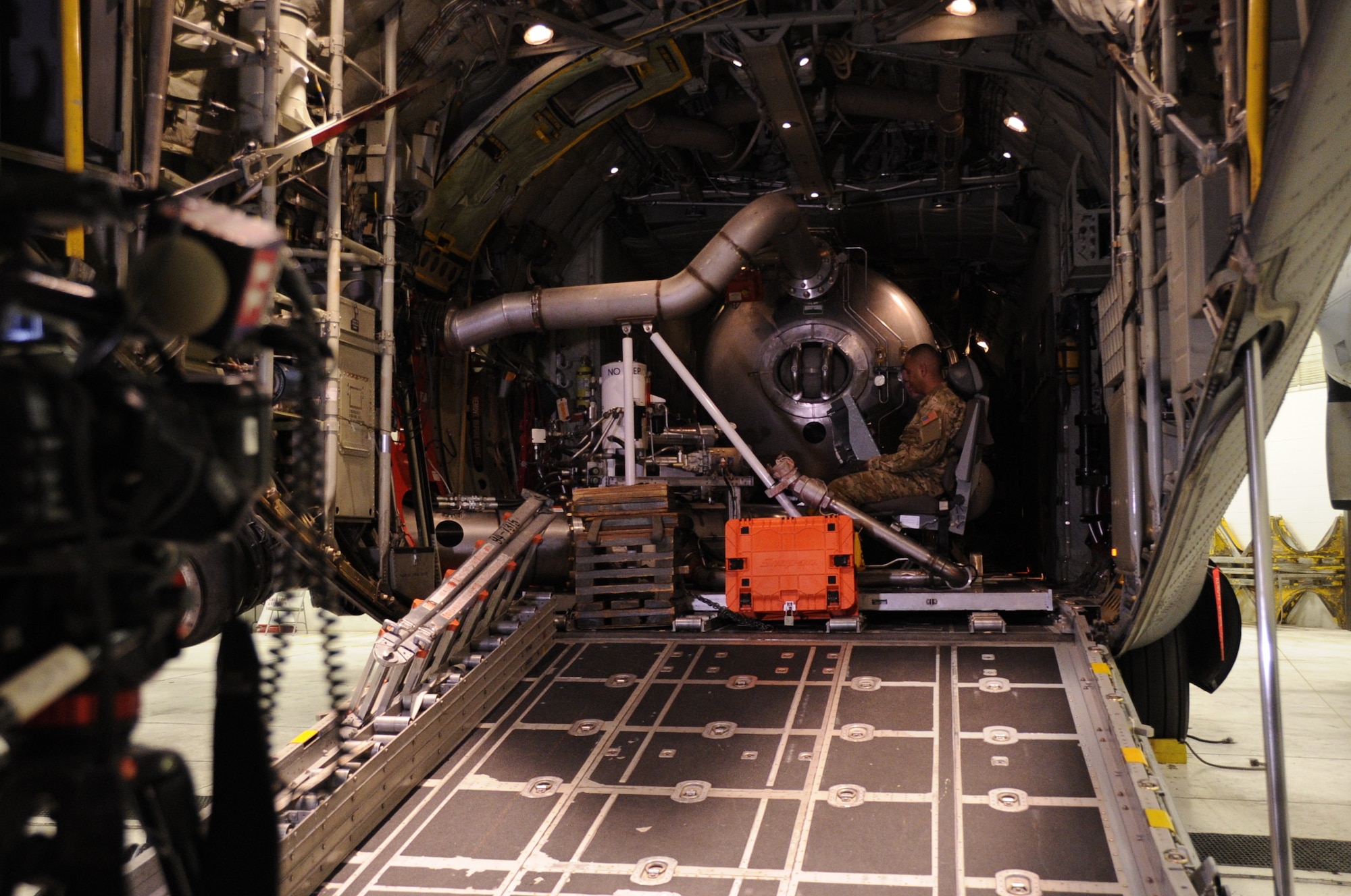 Airmen from the 731st Airlift Squadron demonstrate how they use a U.S. Department of Agriculture Forest Service Modular Airborne Fire Fighting System during the 302nd Airlift Wing’s MAFFS Media Day, April 20, 2018, at Peterson Air Force Base, Colorado.