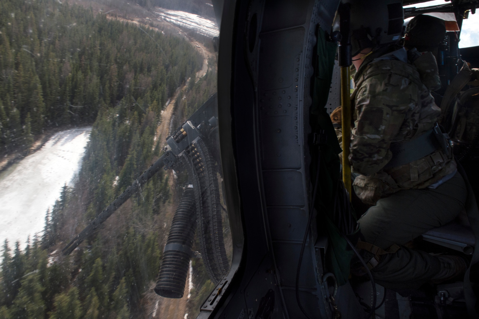 Two HH-60s took to the skies above JBER for the week-long training. The pilots and crew maneuvered though various scenarios before firing at stationary targets.