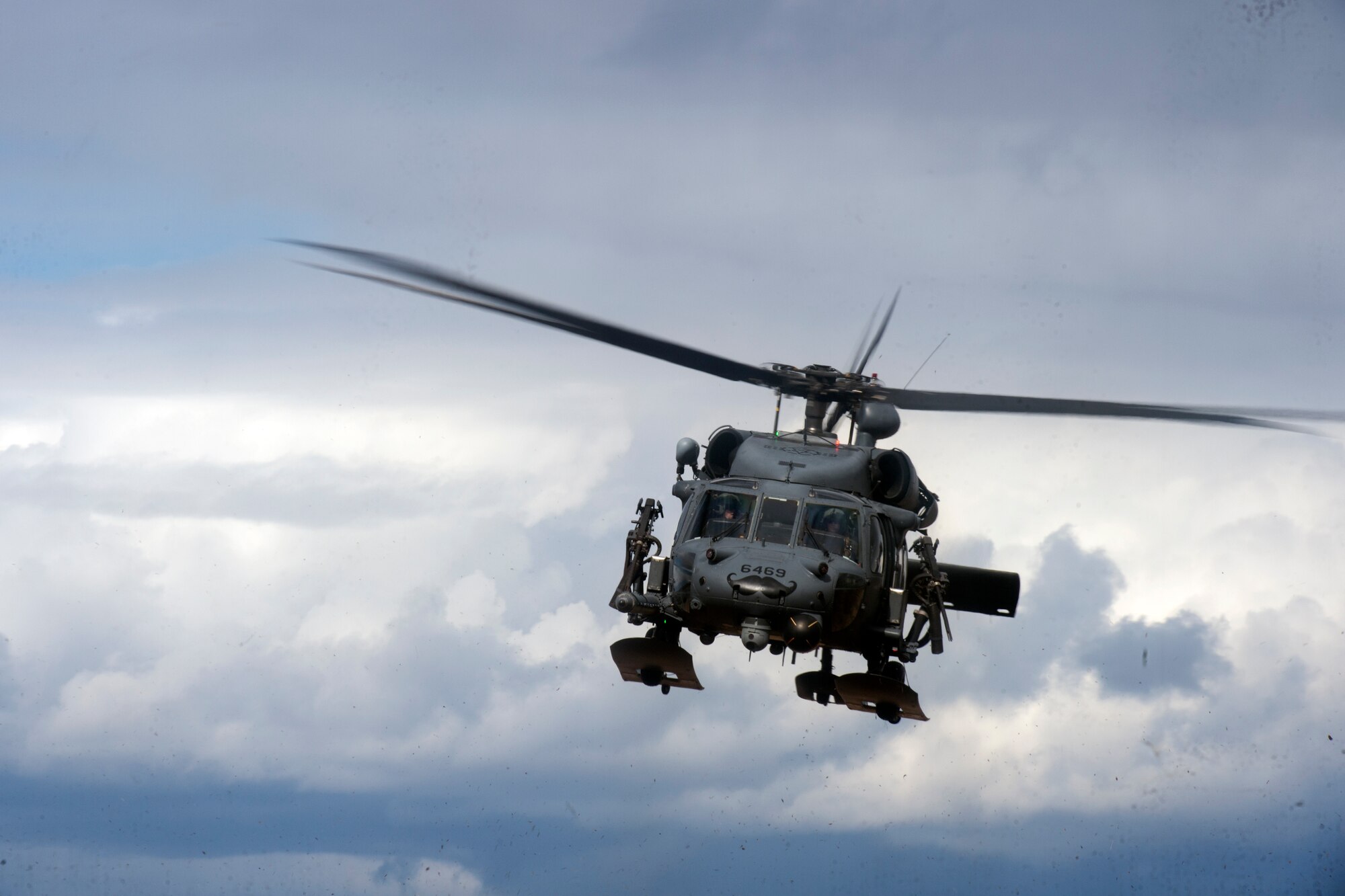 Two HH-60s took to the skies above JBER for the week-long training. The pilots and crew maneuvered though various scenarios before firing at stationary targets.