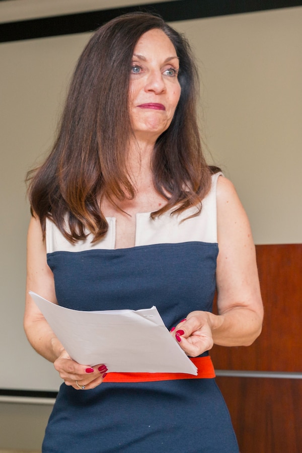 Dawn Herring, a licensed mairrage and family therapist with over 20 years of experience, speaks to patrons in the James L. Day memorial building aboard Marine Corps Logistics Base Barstow, Calif., April 11.