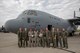 Members of the C-130J Super Hercules number 5843 delivery team pose for a photo