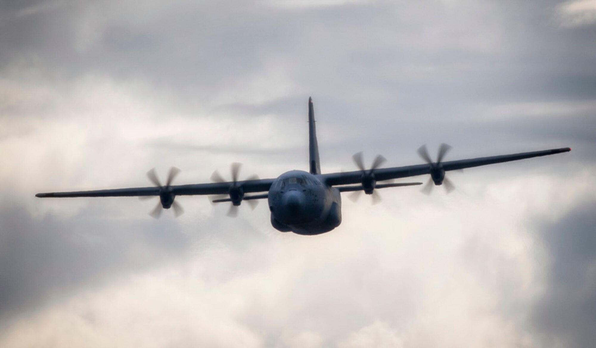 A C-130J Super Hercules flies over Yokota Air Base, Japan, April 27, 2018
