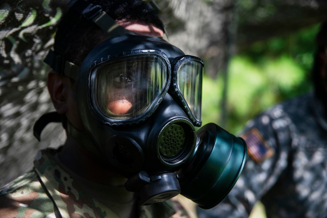 A soldier wears a field protective mask during exercise Centurion Focus.