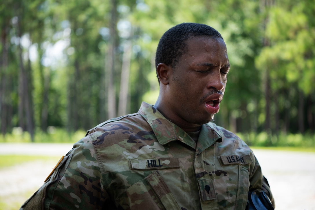 A soldier feels the effects of leaving a gas chamber during exercise Centurion Focus.
