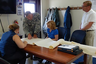 Real Property Task Force Team during a planning session before deploying.