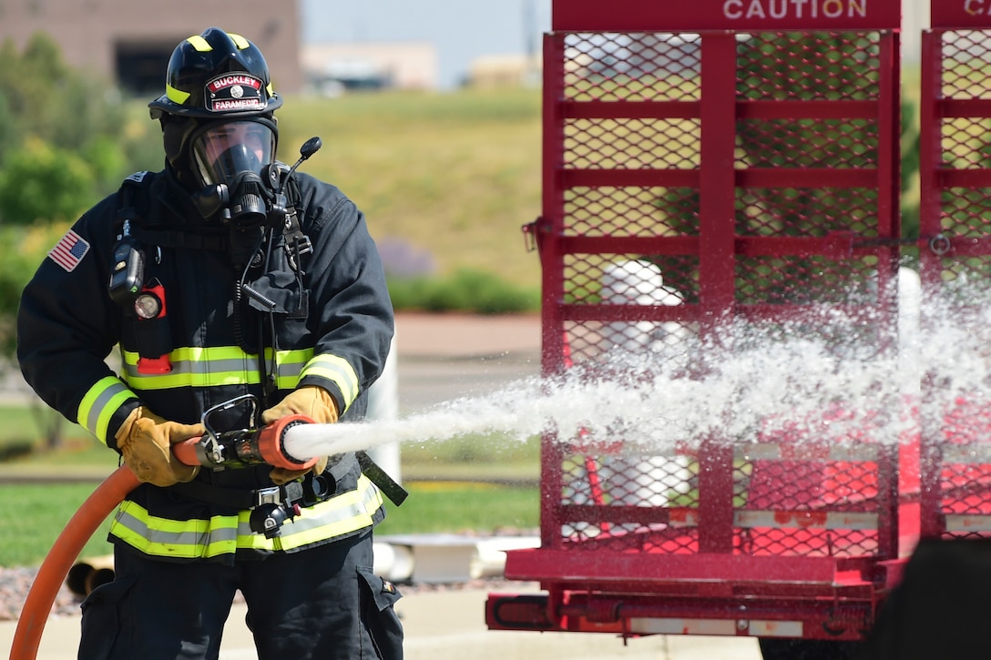 Firefighters participate in Exercise Panther View at Buckley Air Force Base.