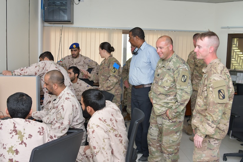 Soldiers with 155th Armored Brigade Combat Team (Mississippi Army National Guard), Task Force Spartan and the United Arab Emirates Land Force Component discusses courses of action during the Iron Union 7 exercise July 9, 2018. The exercise brought together U.S. and Emirati soldiers to improve coordination and communication.