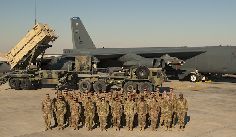 The Top Notch 11th Air Defense Artillery “Imperial” Brigade headquarters, Task Force Spartan, poses for a photo with the assistance of the U.S. Air Force B-52 Bomber Wing Jan. 12, 2018.