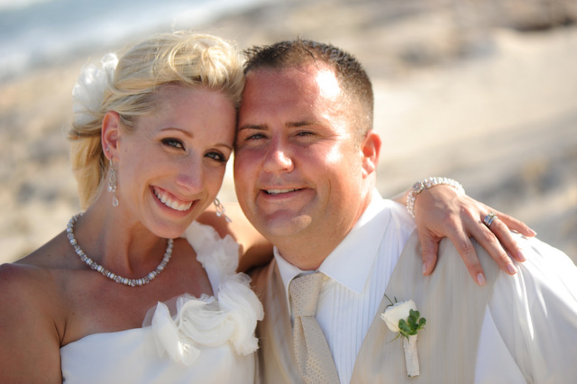 Erik Leslie and his wife, Adrienne pose for a picture on their wedding day.  Leslie is the owner and CEO of Tailwind Ventures and currently serves as an honorary commander of the Logistics Readiness Squadron at the 115th Fighter Wing.  Leslie manages a family-owned company and maintains a leadership philosophy that family should always come first in your personal and business life.