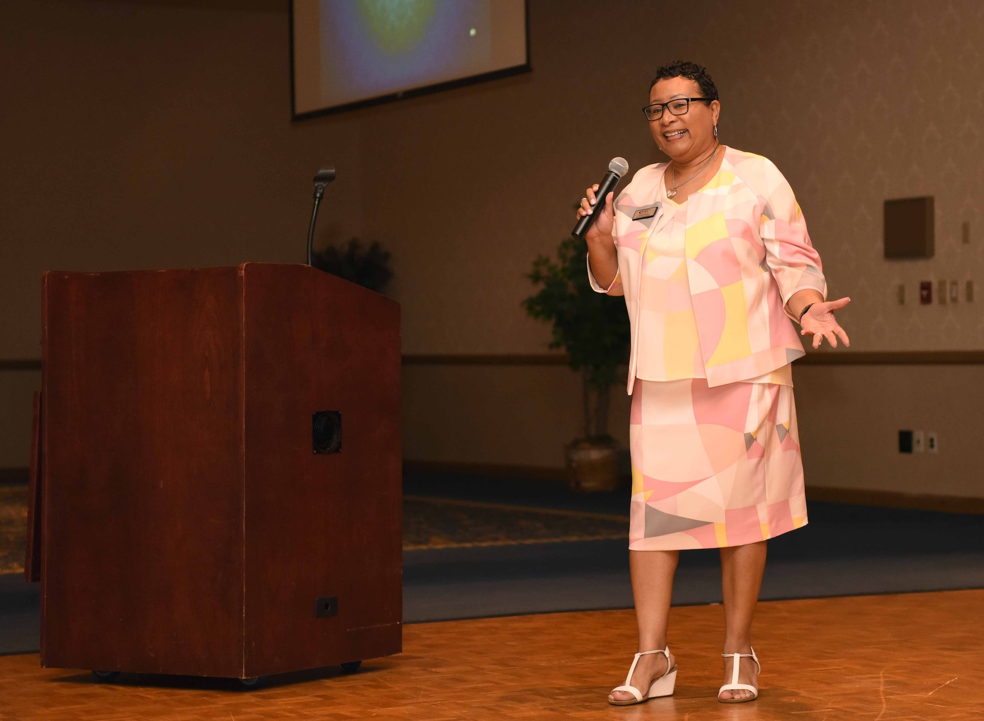 Quency Henson, a professionalism analyst and instructor of the Enhancing Human Capital Course speaks to Airmen July 27, 2018, at the Pacific Coast Club, on Vandenberg Air Force Base, Calfi. Henson teaches the Enhancing Human Capital Course as well as the instructor course for the Profession of Arms Center of Excellence. (U.S. Air Force photo by Airman 1st Class Hanah Abercrombie/Released)