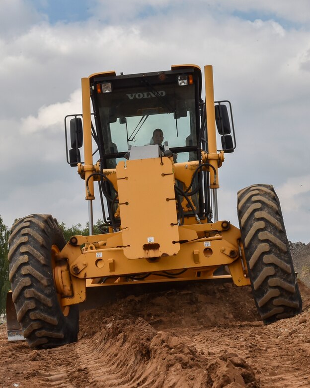 Lt. Col. Robert Wengerter, the commander of the 910th Logistics Readiness Squadron, was in charge of the 910th Airlift Wing Reserve Citizen Airmen who spent annual training in Germany. Wengerter embodied his own rule “Work hard, play hard” by dusting off his old enlisted “Dirt boy” training and hopping in a motor grader to level off a beaten up path on the 52nd CES yard.