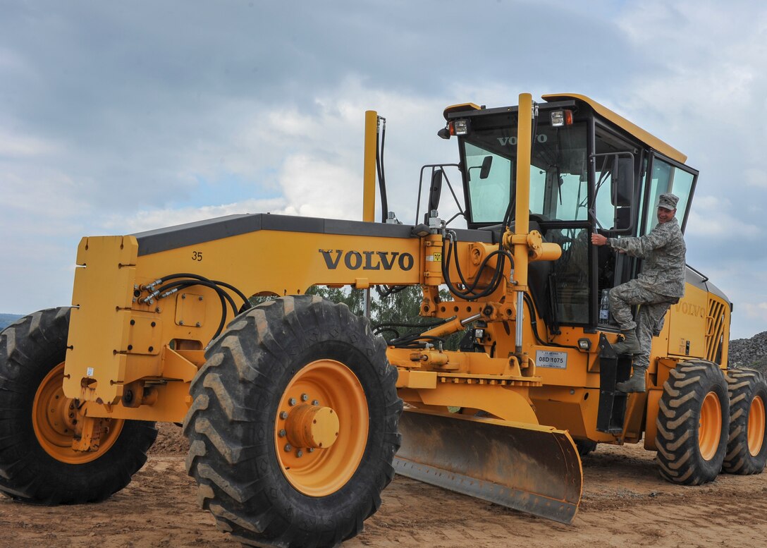 Lt. Col. Robert Wengerter, the commander of the 910th Logistics Readiness Squadron, was in charge of the 910th Airlift Wing Reserve Citizen Airmen who spent annual training in Germany. Wengerter embodied his own rule “Work hard, play hard” by dusting off his old enlisted “Dirt boy” training and hopping in a motor grader to level off a beaten up path on the 52nd CES yard.
