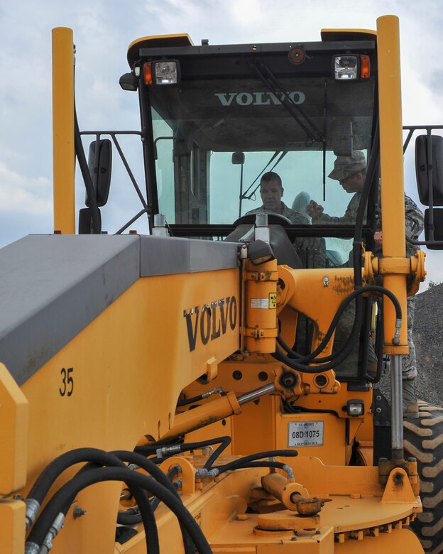 Lt. Col. Robert Wengerter, the commander of the 910th Logistics Readiness Squadron, was in charge of the 910th Airlift Wing Reserve Citizen Airmen who spent annual training in Germany. Wengerter embodied his own rule “Work hard, play hard” by dusting off his old enlisted “Dirt boy” training and hopping in a motor grader to level off a beaten up path on the 52nd CES yard.