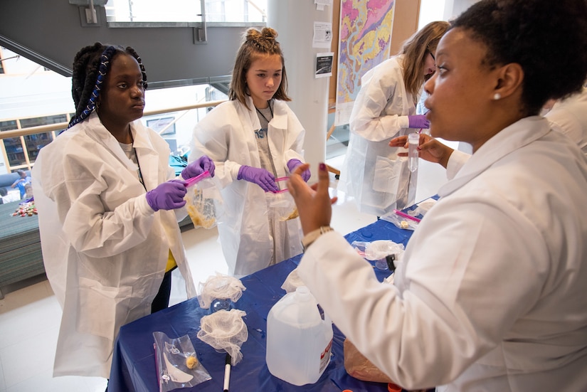 Attendees from the seventh annual Girls Day Out practice the steps used to extract DNA during a hands-on learning session July 27, 2018, at the College of Charleston with professionals from the Medical University of South Carolina.