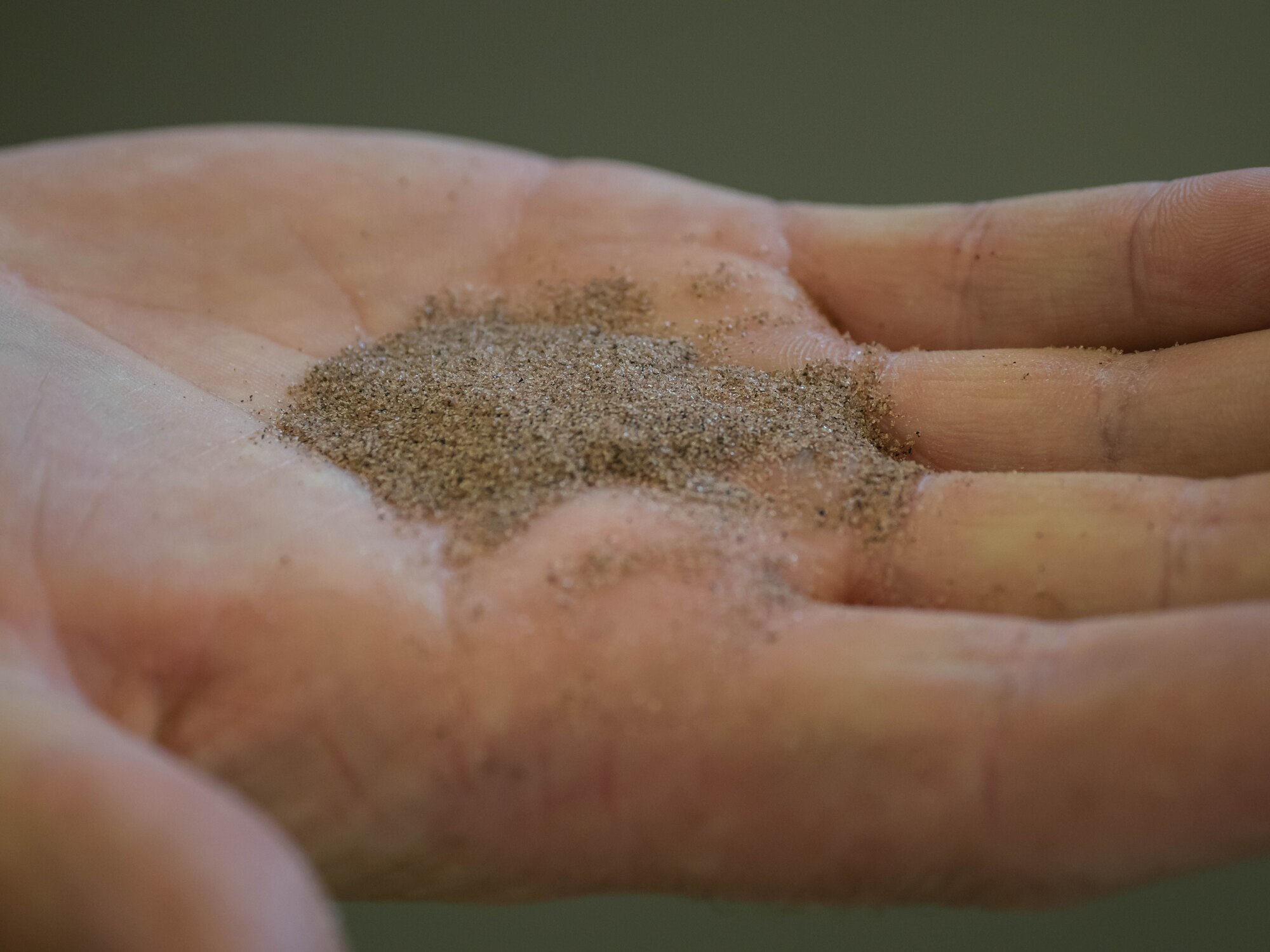 The garnet abrasive that is mixed with water to perform the cutting. (Air Force Photo/Paul Zadach)