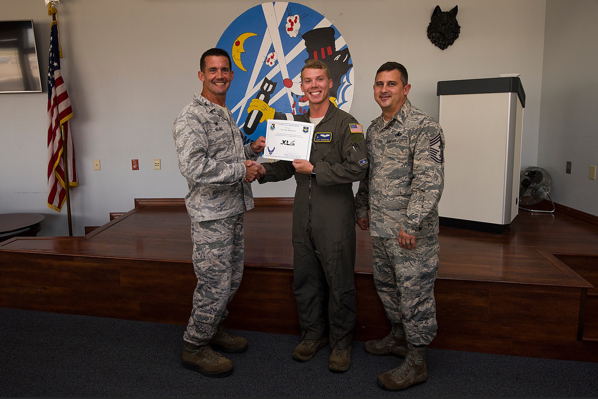 First Lieutenant Clay Reierson, 86th Flying Training Squadron instructor pilot and flight scheduler, was chosen by wing leadership to be the “XLer” of the week, for the week of July, 23, 2018, at Laughlin Air Force Base, Texas. The “XLer” award, presented by Col. Charlie Velino, 47th Flying Training Wing commander, is given to those who consistently make outstanding contributions to their unit and the Laughlin mission. (U.S. Air Force photo by Airman 1st Class Anne McCready)