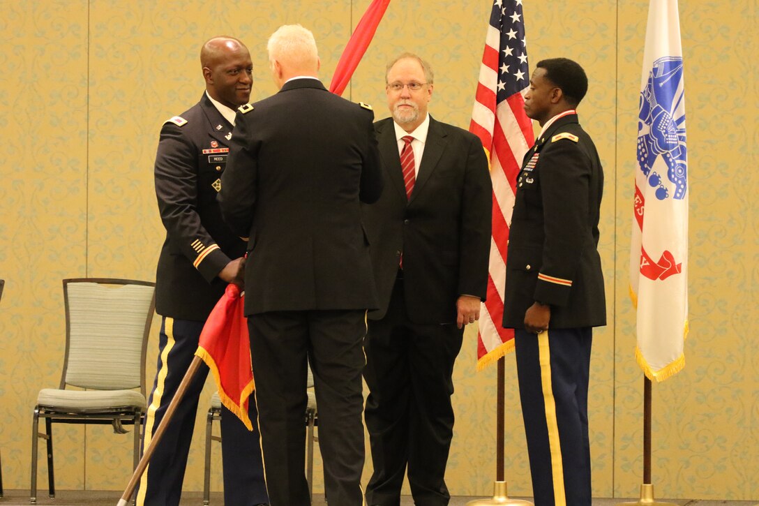 Col. Kenneth N. Reed assumed command from Col. Calvin C. Hudson II July 27 in a ceremony officiated by Brig. Gen. Paul E. Owen, U.S. Army Corps of Engineers Southwestern Division. The formal change of command ceremony took place at 2 p.m. at the Omni Hotel in Fort Worth, Texas.