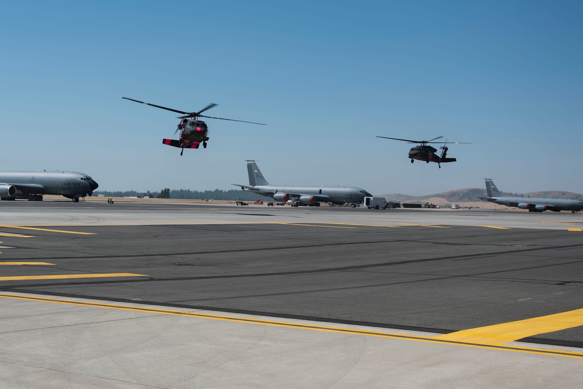 Two Washington National Guard Sikorsky UH-60 Blackhawk helicopters launched from Joint Base Lewis-McChord, Washington, to Fairchild AFB to fight the wildfire dubbed “The Sheep Creek Fire,” Aug. 1, 2018. WNG efforts are currently focused on keeping the fire south of Sheep Creek, located north of Colville National Forest near the United States-Canadian border. Five 20-member local fire-fighting hand crews are already deployed fighting the fire, very soon to be aided by the WNG and its citizen soldiers. (U.S. Air National Guard photo/Tech. Sgt. Michael Brown)