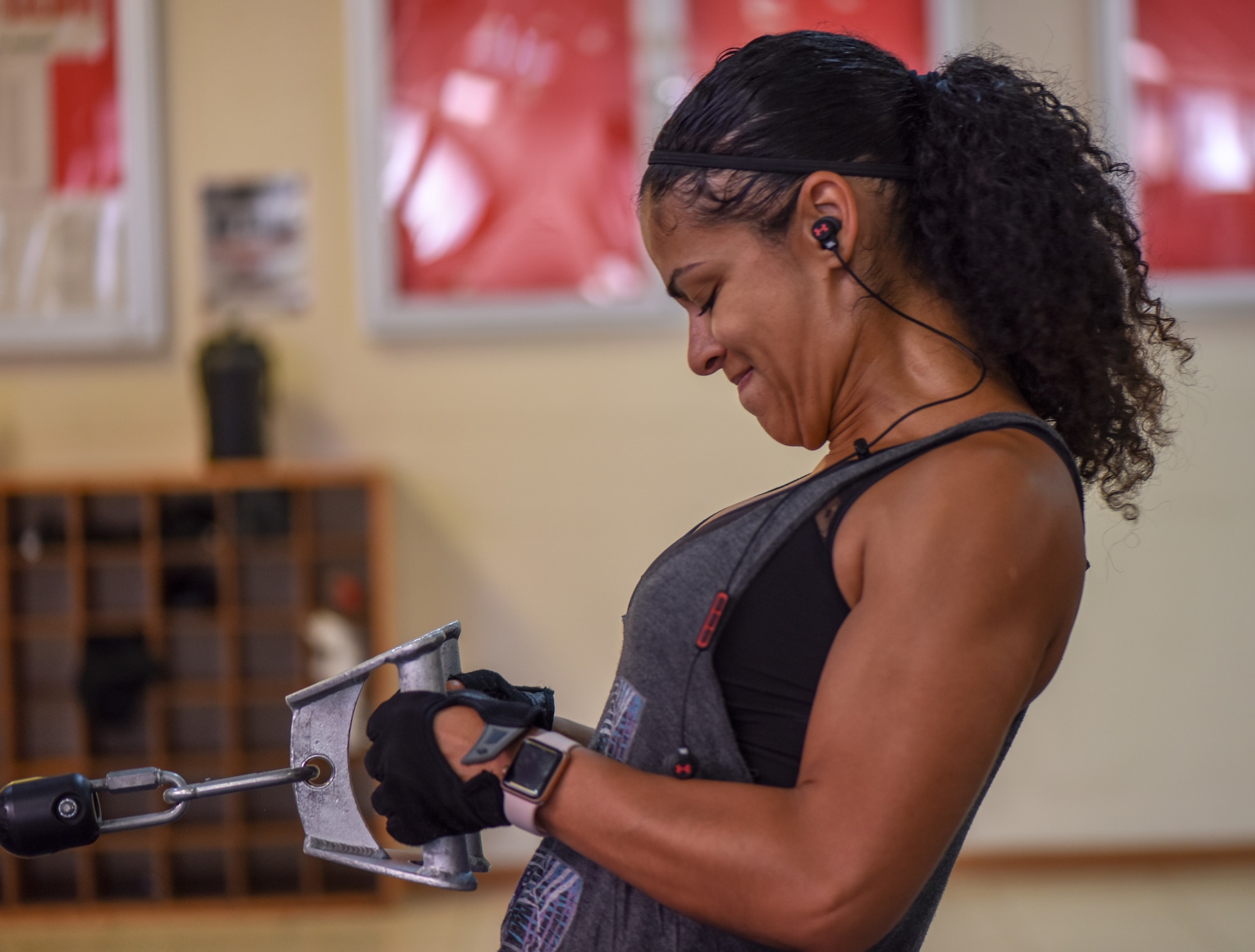 U.S. Air Force Master Sgt. Diana Valdez does a cable row exercises at Incirlik Air Base, Turkey, 2018