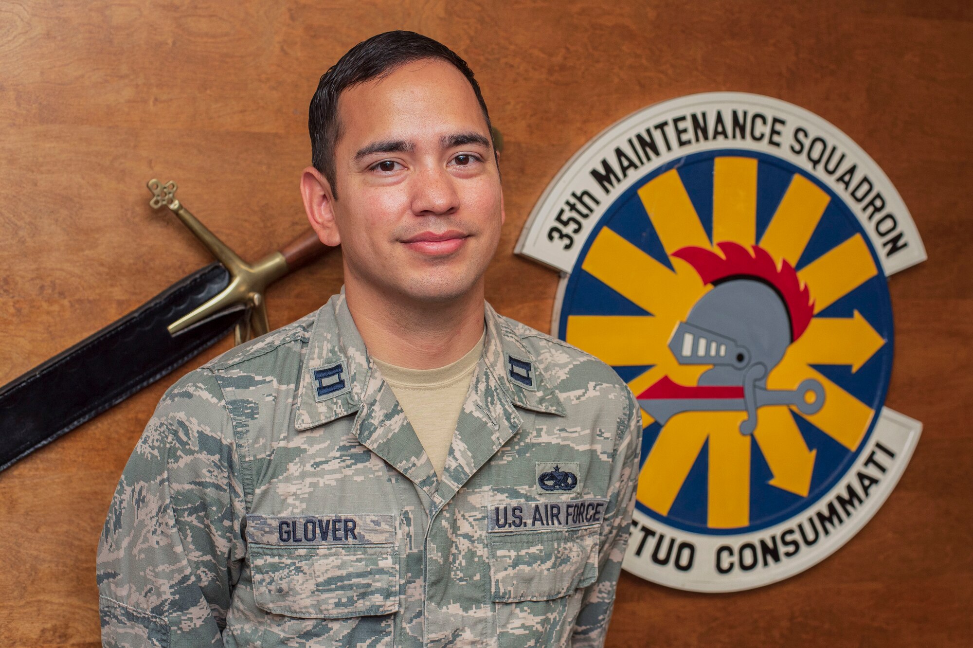 U.S. Air Force Capt. Charles Glover, the 35th Maintenance Squadron Operations officer, pauses for a photo at Misawa Air Base, Japan, July 18, 2018. Glover is a fourth generation maintainer who was picked up for Officer Training School while working as a Civil Service maintainer at Robins Air Force Base, Georgia. (U.S. Air Force photo by Airman 1st Class Collette Brooks)