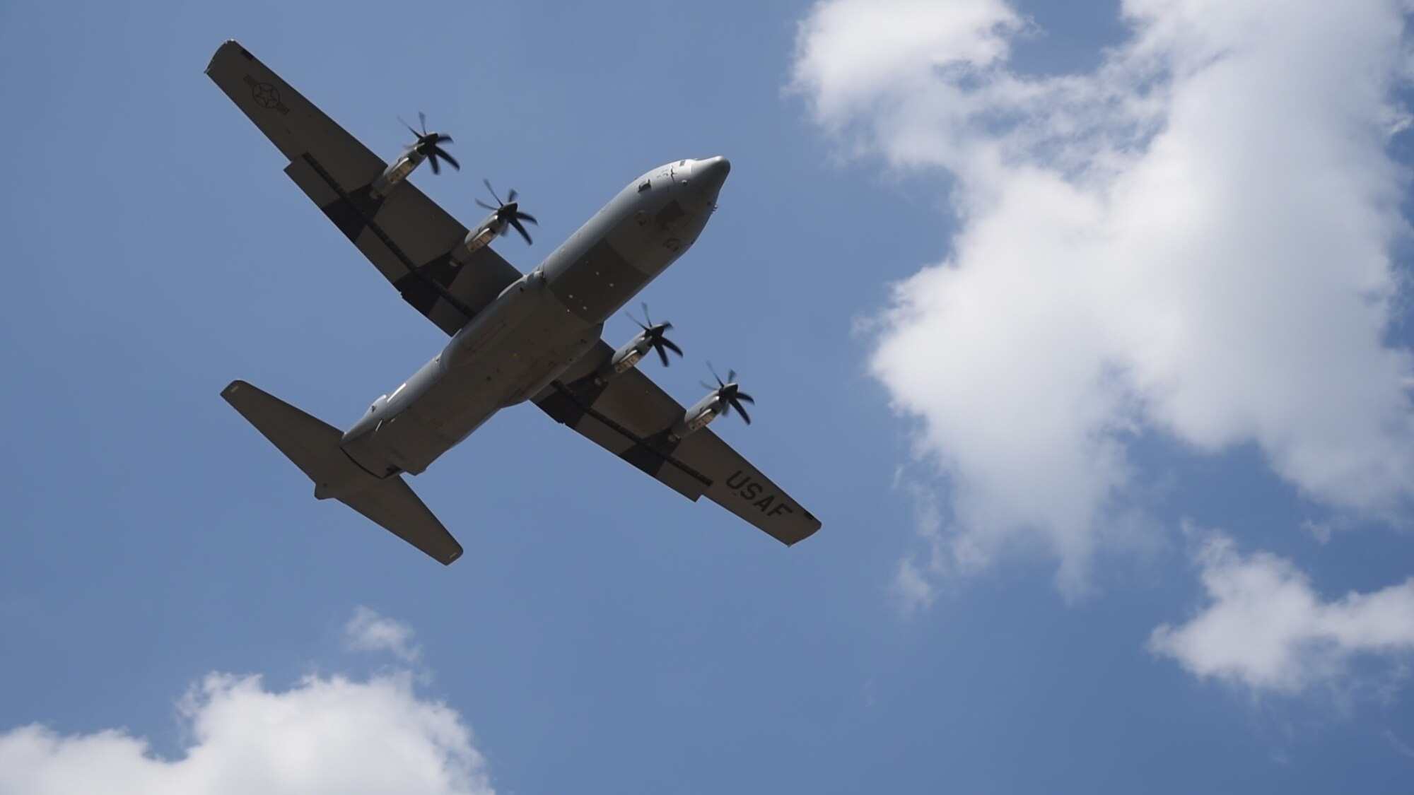 A U.S. Air Force C-130J Super Hercules assigned to the 37th Airlift Squadron flies over Powidz Air Base, Poland, July 31, 2018, as part of a training exercise. U.S. Airmen and Soldiers arrived in Poland to conduct tactical airlift training with the Polish armed forces. (U.S. Air Force photo by Senior Airman Kirsten Brandes)