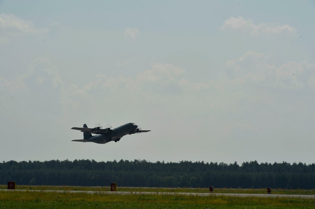 A U.S. Air Force C-130J Super Hercules assigned to the 86th Airlift Wing takes off from Powidz Air Base, Poland, July 31, 2018. Approximately 100 Airmen and three aircraft arrived in Poland to conduct bilateral training exercises with the Polish Air Force. (U.S. Air Force photo by Senior Airman Joshua Magbanua)