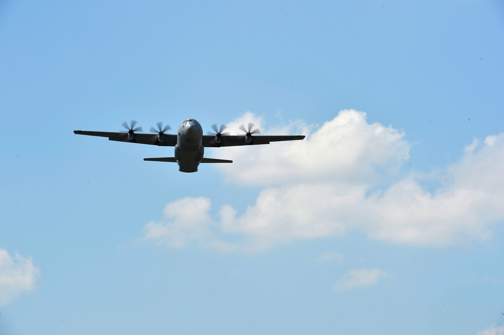 A U.S. Air Force C-130J Super Hercules assigned to the 86th Airlift Wing flies over Powidz Air Base, Poland, July 31, 2018, during a training exercise. U.S. Airmen and Soldiers arrived in Poland to conduct tactical airlift training and with the Polish armed forces. (U.S. Air Force photo by Senior Airman Joshua Magbanua)
