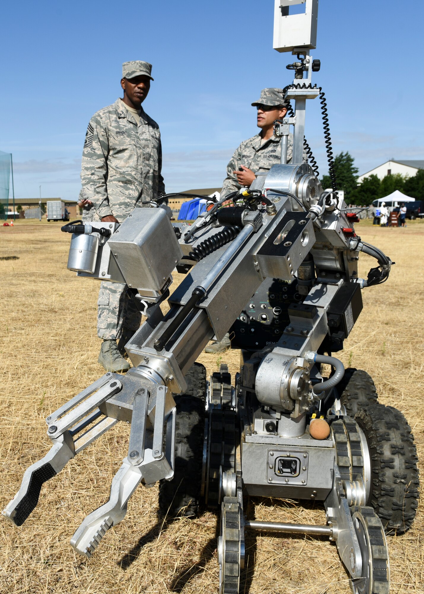 Chief Master Sgt. of the Air Force Kaleth O. Wright examines an explosive ordnance disposal robot during an immersion tour, Aug. 1, 2018 at Royal Air Force Lakenheath, England. Wright was briefed on the procedures EOD Airmen follow while using the EOD disposal robot during operations. (U.S. Air Force photo/Airman 1st Class Christopher S. Sparks)
