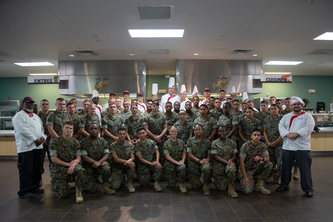 Marine food service specialists with Marine Corps Installations East participate in Culinary Foundation Training hosted by Sodexo at Mess Hall 128, Marine Corps Base Camp Lejeune, July 11. The training teaches Marine food service specialists methods to improve the basic services they provide involving baking, roasting, recipe use, cold food preparation and grilling. (U.S. Marine Corps photo by Lance Cpl. Ashley Gomez)