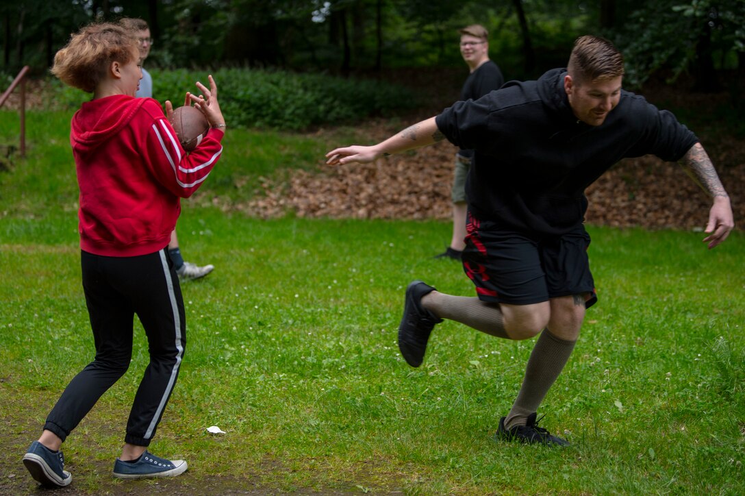 The 52nd MXS Airmen taught the students how to play American football and shared with their experiences growing up in the United States.