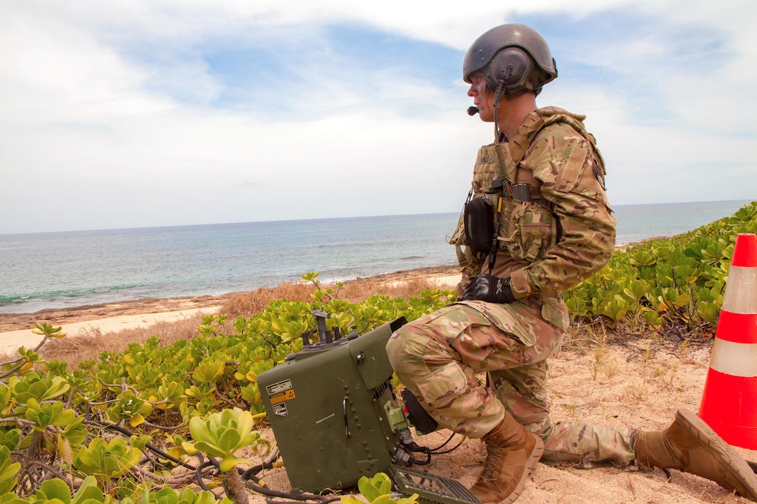 A soldier waits for his follow-on orders before firing a stinger missile.
