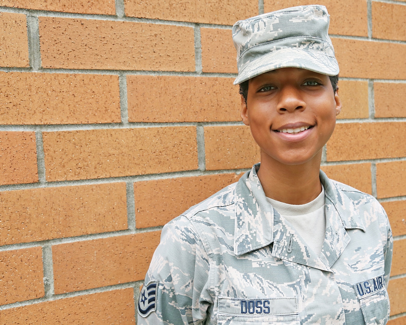 Staff Sgt. Psalmbrea Noel Doss, a personnel specialist with the 194th Force Support Squadron assigned to the Washington Air National Guard, poses for a photo July 18, 2018, at Camp Murray, Wash. Doss heard about the Air National Guard through her mother, who was also once a personnel specialist in the Air Force.