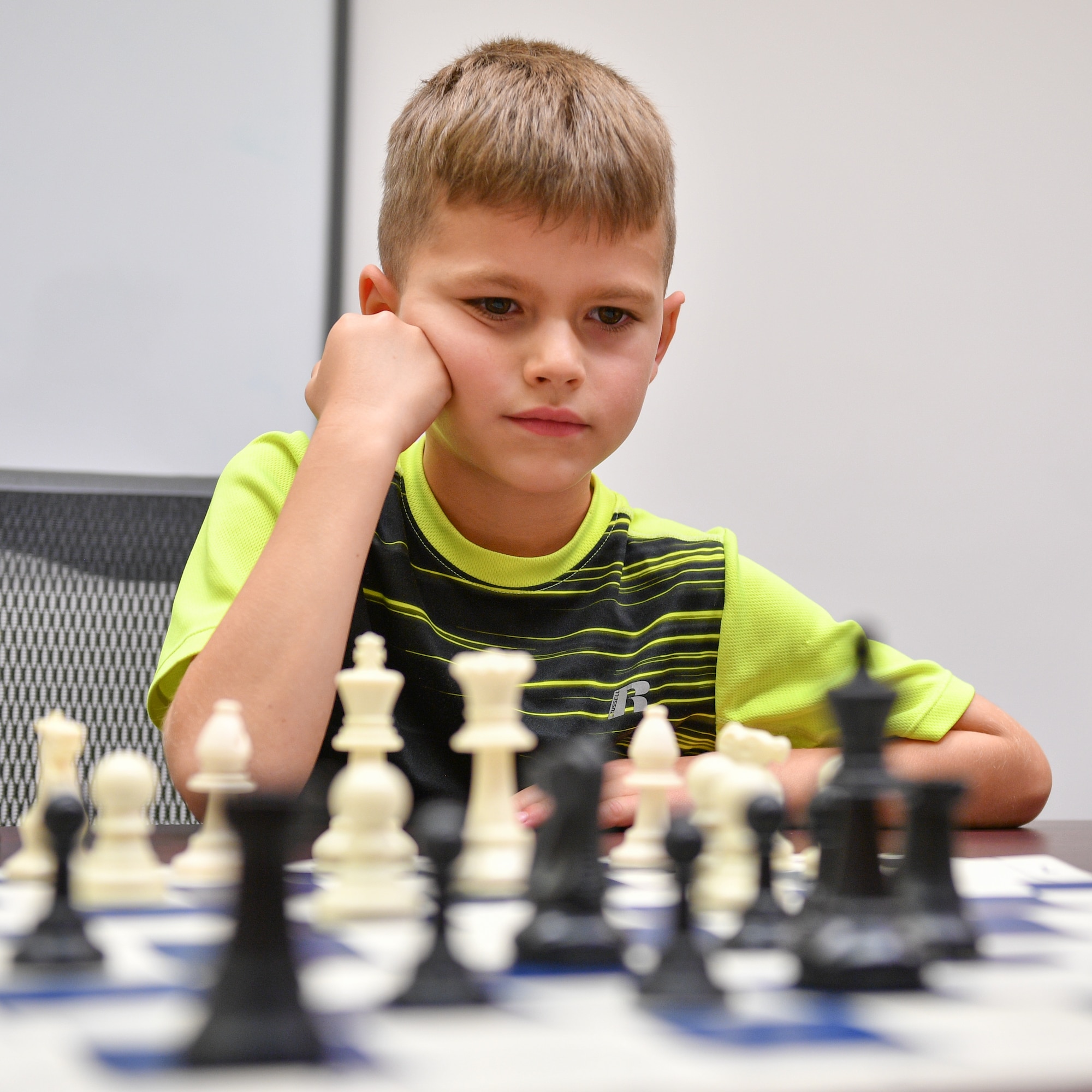 Roman Widmer considers his next move during a chess club meeting at Hill Air Force Base, Utah, July 26, 2018. The club is hosted by the Gerrity Memorial Library every other Thursday and is open to anyone with base access. (U.S. Air Force photo by R. Nial Bradshaw)