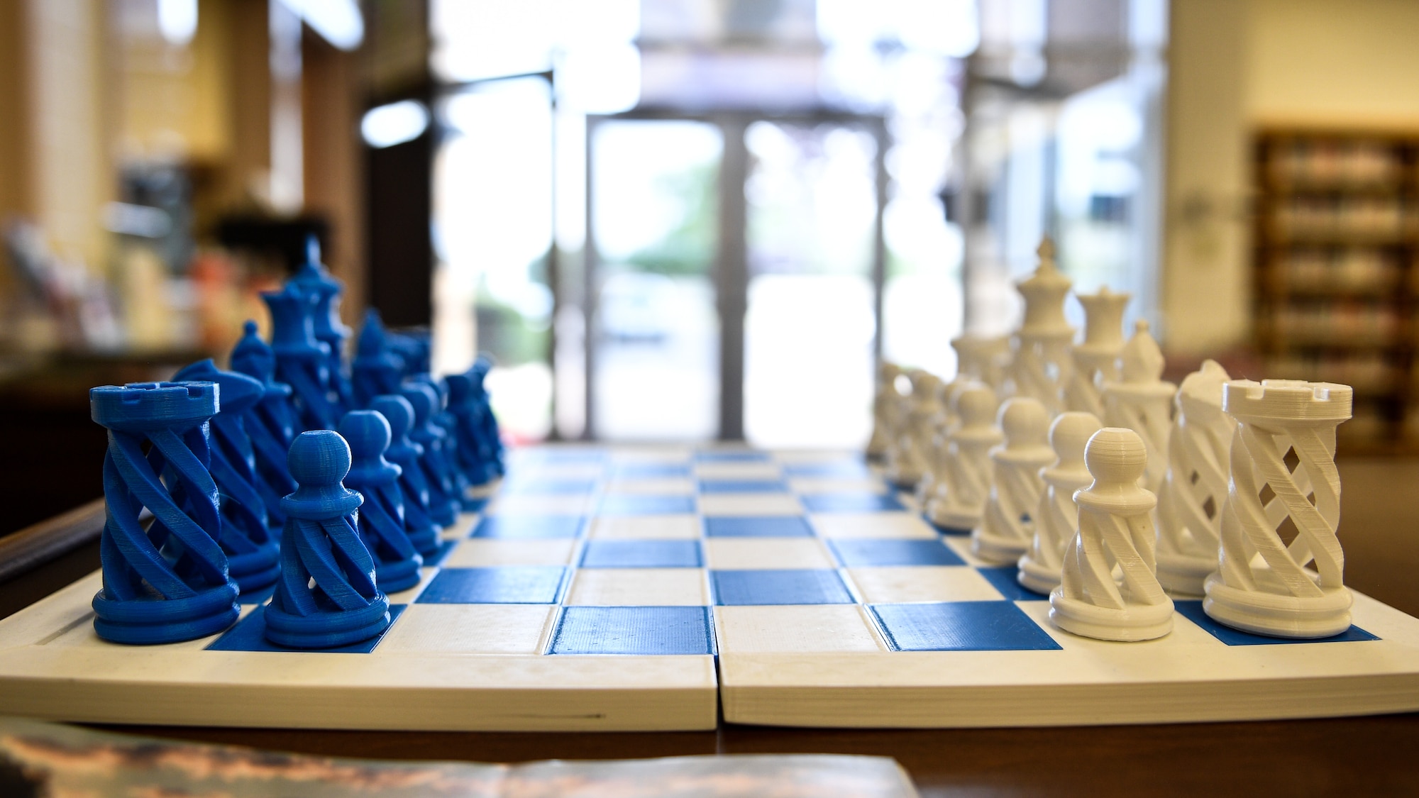A chess set printed by the Gerrity Memorial Library's 3-D printer sits on a table at Hill Air Force Base, Utah, July 26, 2018. Visitors can bring in 3-D printer programs and have their projects printed by library staff. (U.S. Air Force photo by R. Nial Bradshaw)