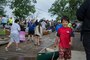 paddlers prepare to launch canoes