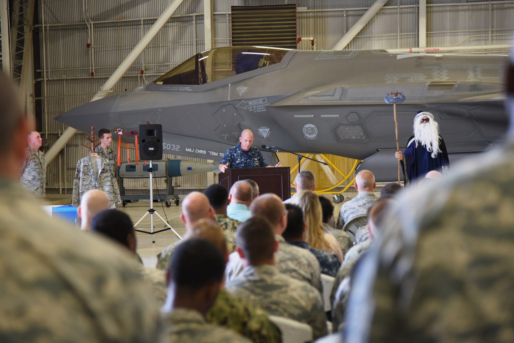 U.S. Navy Cmdr. Matthew Scott, 33rd Maintenance Squadron commander, presides over the first enlisted frocking ceremony in Air Education and Training Command on Aug. 1, 2018 at Eglin AFB, Fla. A frocking ceremony allows a military member to pin on new rank prior to their promotion date. (U.S. Air Force photo by 1st Lt. Savannah Stephens)