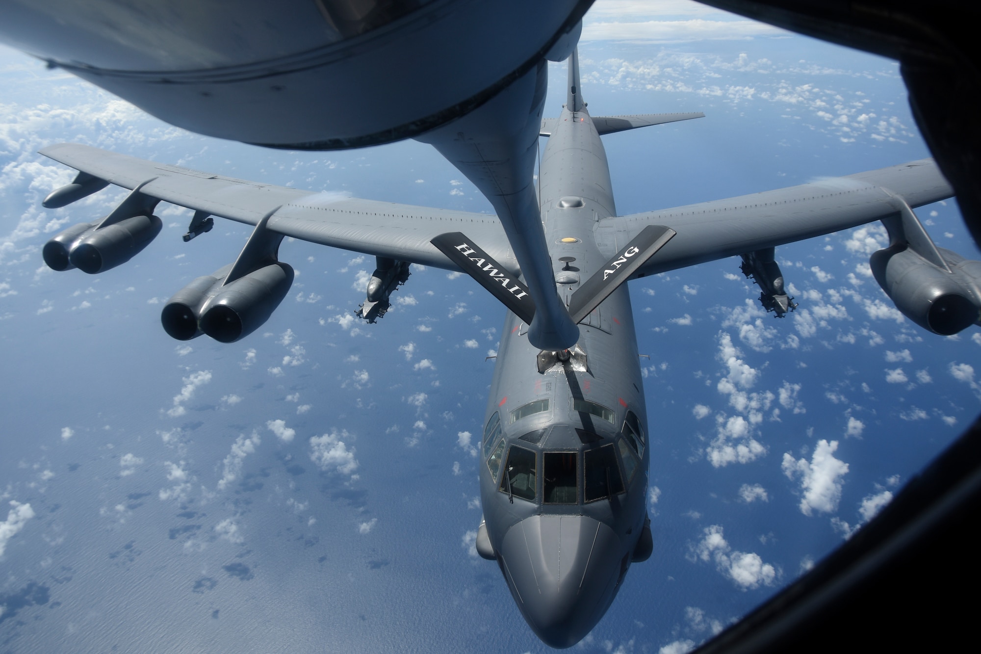A U.S. Air Force B-52H Stratofortress bomber gets refueled over the Pacific Ocean during a routine training mission Aug. 2, 2018. This mission was flown in support of U.S. Indo-Pacific Command’s Continuous Bomber Presence operations, which are a key component to improving combined and joint service interoperability. (U.S. Air Force photo by Airman 1st Class Gerald R. Willis)