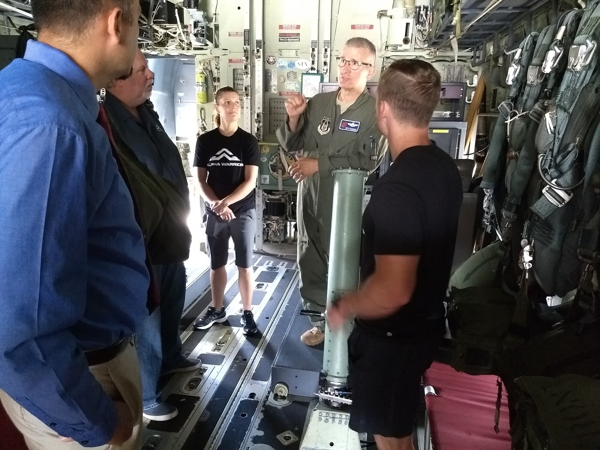 Kevin Klein and Sara Heesen, American Ninja Warriors, were briefed on the hurricane mission and toured a WC-130J of the 53rd Weather Reconnaissance Squadron, 403rd Wing, during the Alpha Warrior tour at Keesler Air Force Base, Mississippi Aug. 2, 2018. Alpha Warrior, built around a unique apparatus, challenges Airmen as they tackle the various obstacles or stations. This program is designed to enhance fitness training by helping Airmen build and maintain resiliency, while at home or deployed. (US. Air
Force photo by Master Sgt. Jessica Kendziorek)