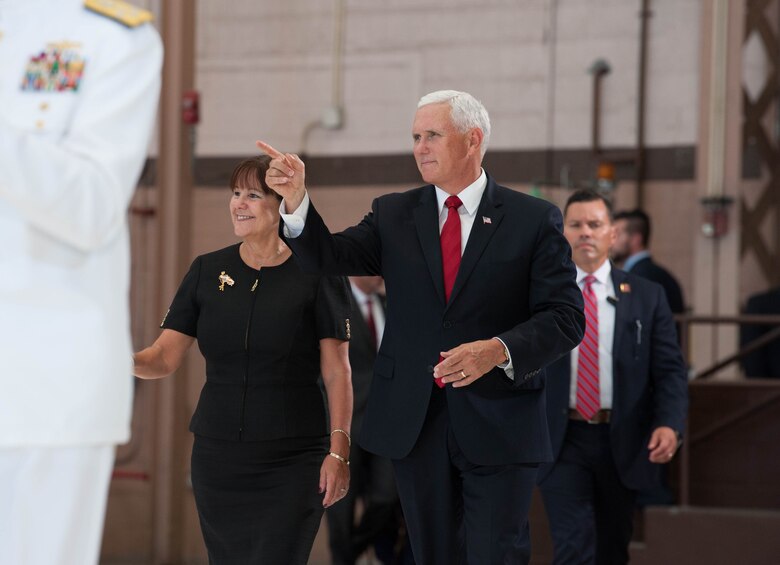 Vice President Michael R. Pence meets with service members during a troop engagement on Joint Base Pearl Harbor-Hickam, August 1, 2018. Pence gave remarks at the honorable carry ceremony held at JPBH-H, honoring the memory of those lost during the Korean War and welcoming home the remains of the fallen. Following the ceremony, he met with approximately 100 local service members and their families from all military branches. Pence mingled amongst the troops shaking hands, taking photos and thanking them for their service. (U.S. Air Force photo by Hailey Haux)