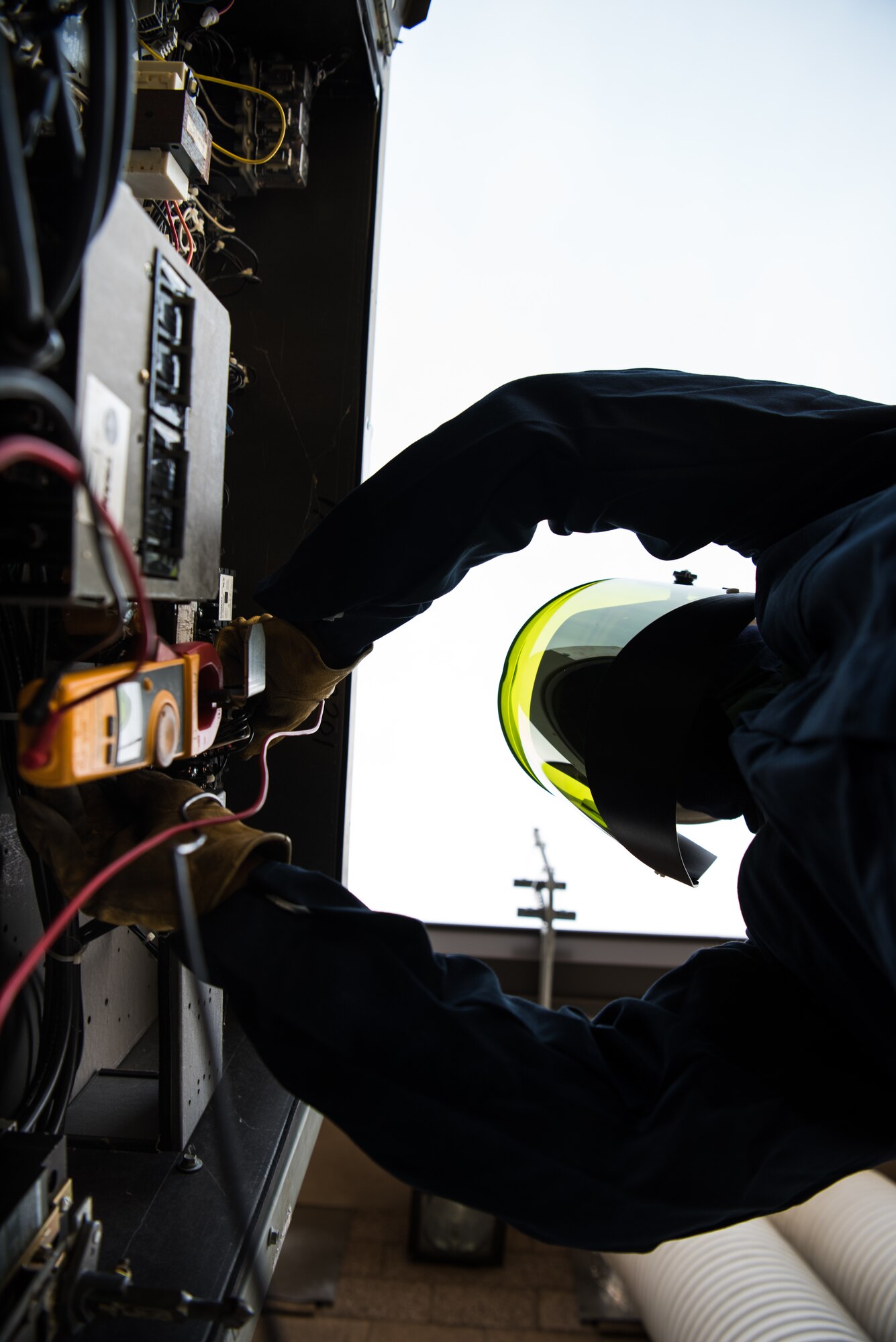 Airman 1st Class Charles Song, 9th Civil Engineer Squadron heating, ventilation and air conditioning technician, tests the voltage on various connections in order to pinpoint any deficiencies at Beale Air Force Base, California, Aug. 2, 2018. HVAC Airmen spend six months receiving technical training at Sheppard Air Force Base, Texas, by both Navy and Air Force instructors. (U.S. photo by Senior Airman Justin Parsons)