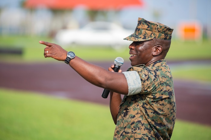 Sgt. Maj. James E. Monroe gives final remarksduring a relief and appointment ceremony for Headquarters Regiment, 3rd Marine Logistics Group, Aug. 3, 2018 at Camp Kinser, Okinawa, Japan. Sgt. Maj. James E. Monroe ceremoniously transferred accountability and authority of enlisted Marines to Hammock during the ceremony. Monroe is a native of Brewton, Alabama. Hammock is a native of Miami, Florida. (U.S. Marine Corps photo by Cpl. Joshua S. Pinkney)