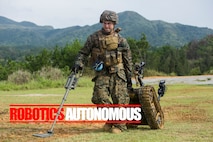 Staff Sgt. David Cain retrieves a Mark II Talon Explosive Ordnance Disposal robot during charge employment training Aug. 2, 2018 at Camp Hansen, Okinawa, Japan.