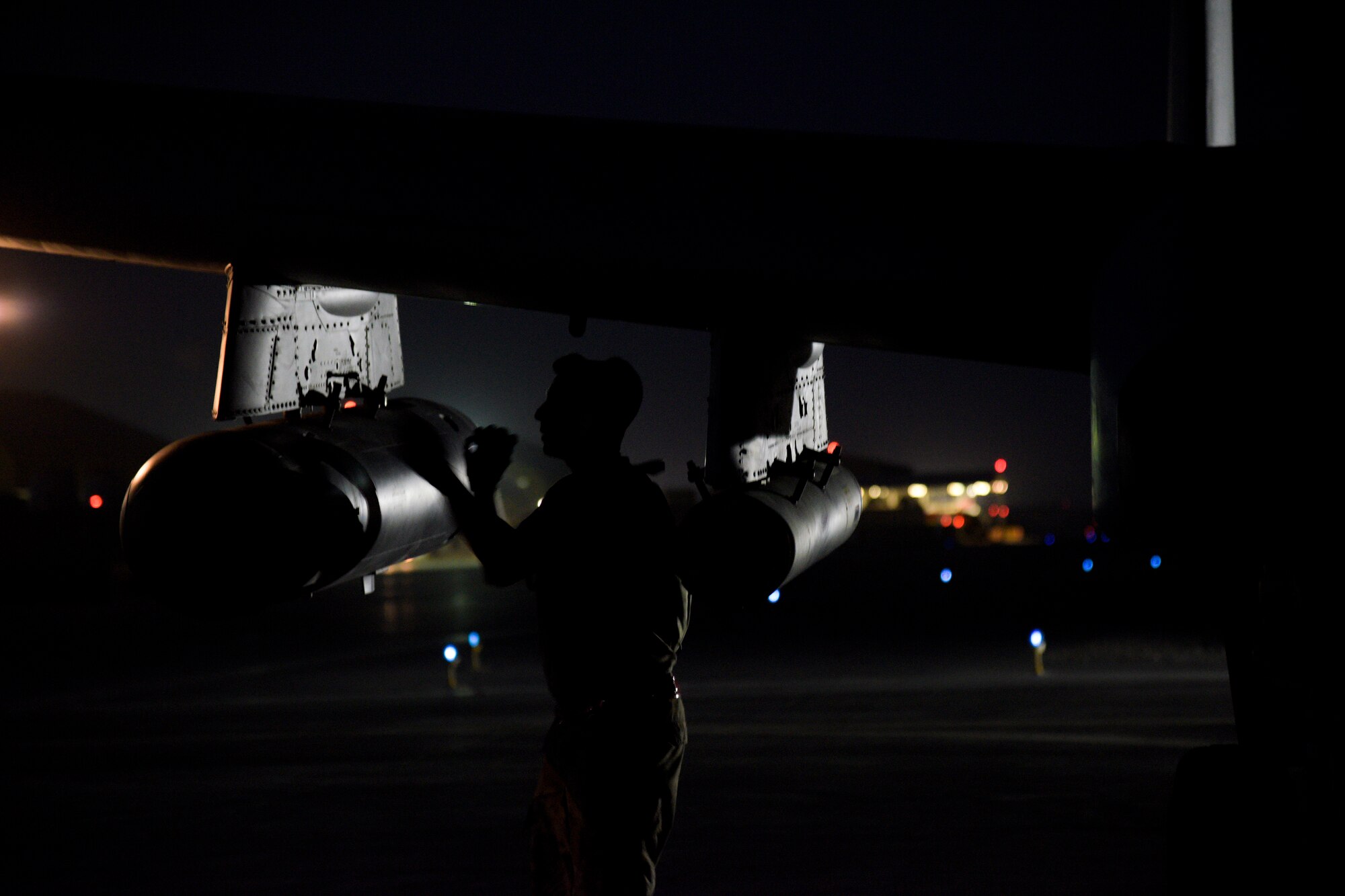 A crew chief from the 75th Expeditionary Fighter Squadron conducts pre-flight checks on an A-10C Thunderbolt II before take-off on Kandahar Airfield, Afghanistan, Aug. 2, 2018. The Airmen, from Moody Air Force Base, Georgia, are deployed in support of Operation Freedom's Sentinel by providing close-air support to Afghan forces and other coalition partners. (U.S. Air Force photo by Staff Sgt. Kristin High)