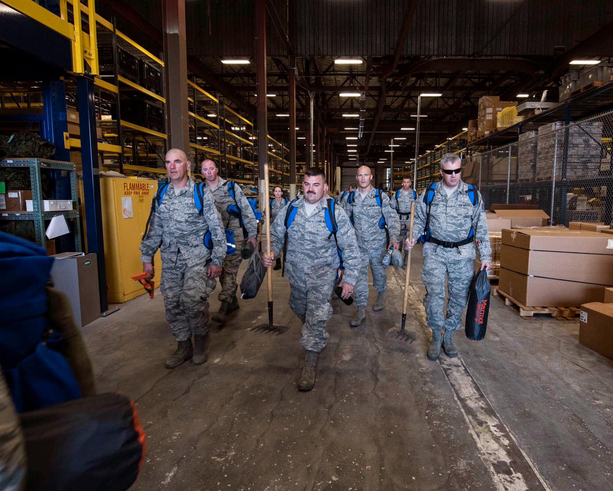 Airmen from the 141st Air Refueling Wing prepare to load emergency response and fire equipment at Fairchild Air Force Base, Wash. during a state mobilization in support of firefighting efforts in eastern Washington August 1, 2018. Gov. Jay Inslee activated Air and Army National Guard personnel to assist in firefighting efforts throughout the region. (U.S. Air National Guard photo by Staff Sgt. Rose M. Lust)