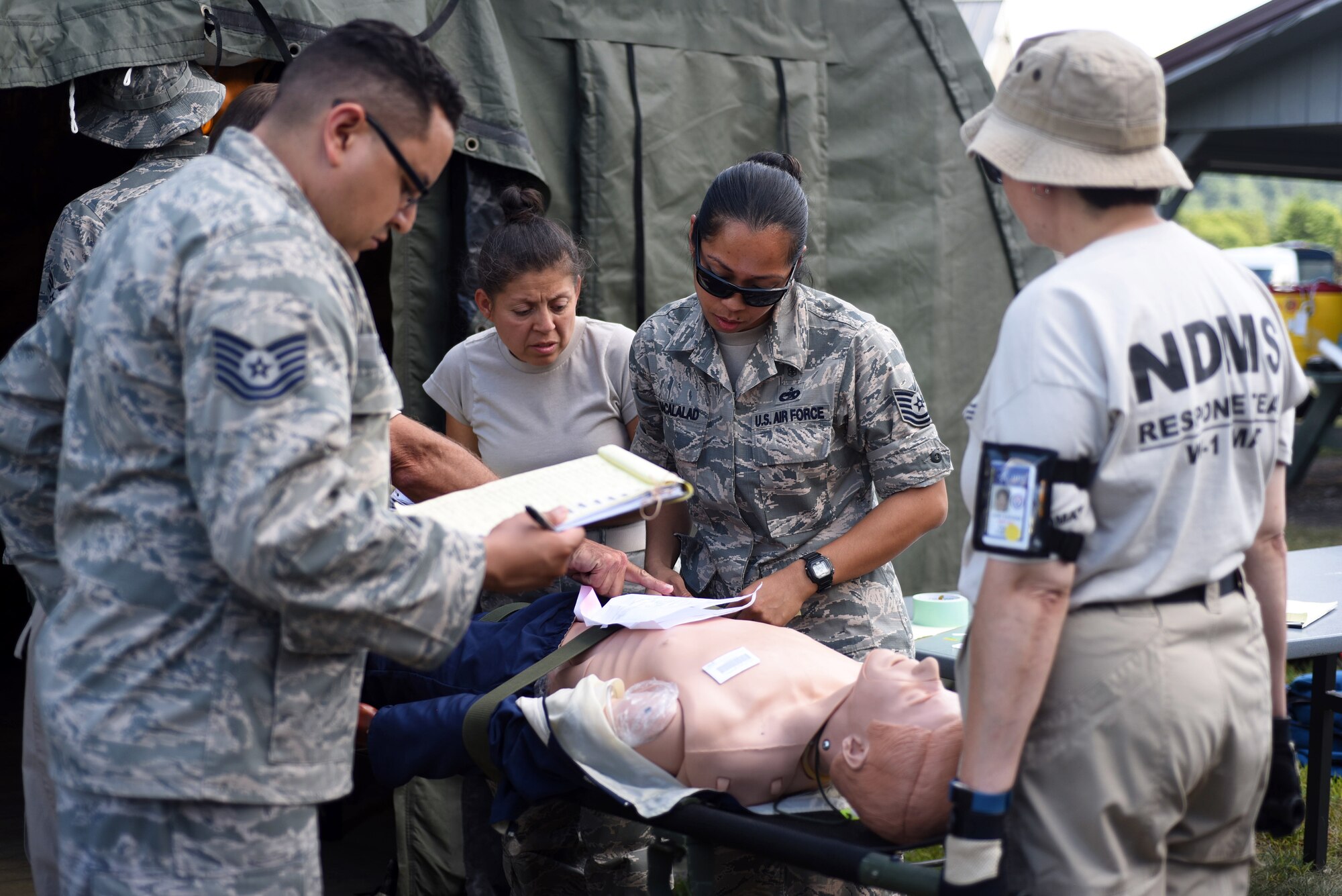 Airmen from the 108th WIng Medical Group, New Jersey Air National Guard, attend PATRIOT North exercise at Volk Field, Wis.