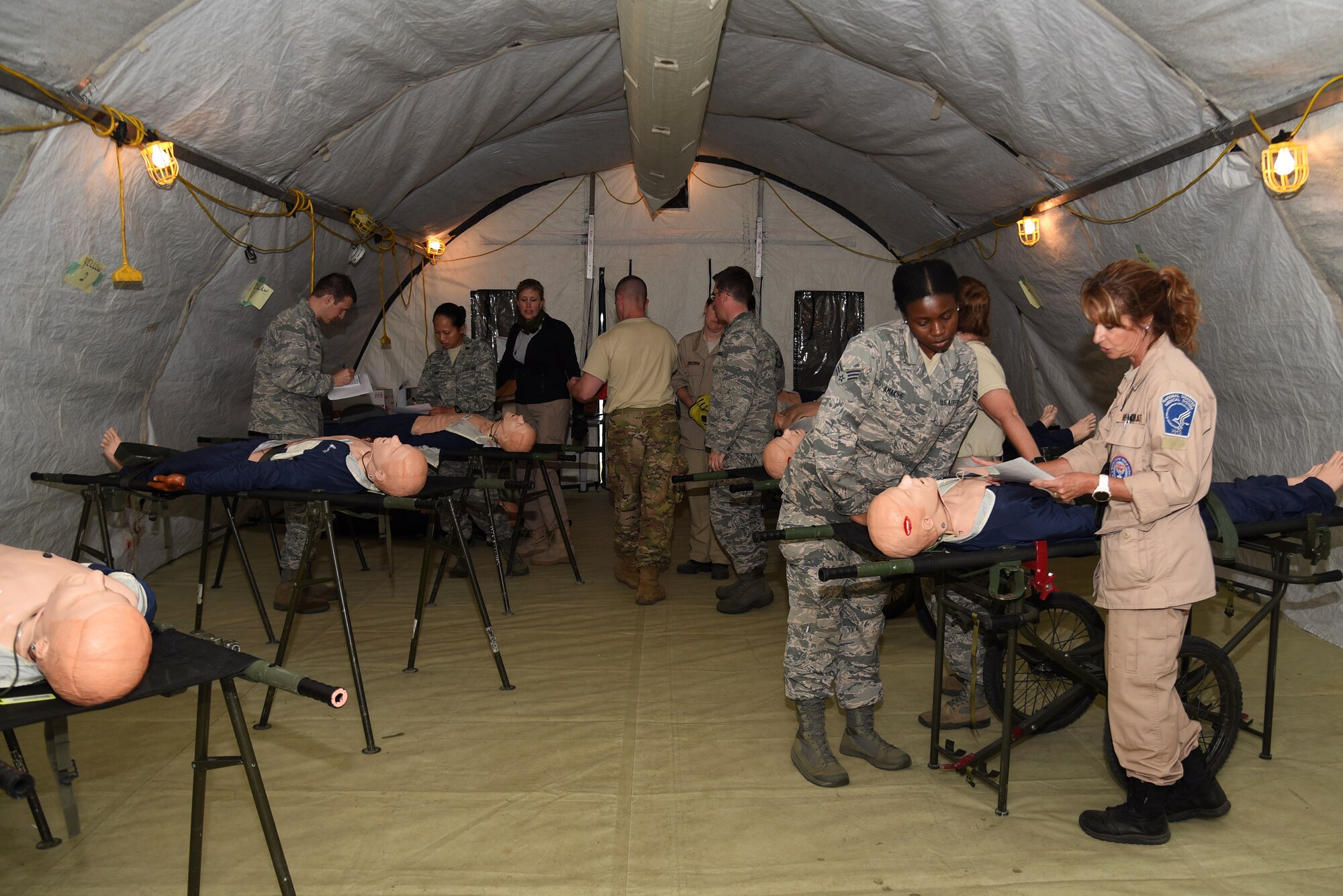 Airmen from the 108th WIng Medical Group, New Jersey Air National Guard, attend PATRIOT North exercise at Volk Field, Wis.