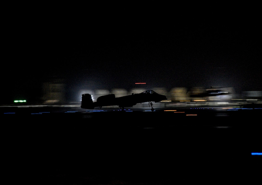 An A-10C Thunderbolt II, from the 75th Expeditionary Fighter Squadron, takes off in front of the Kandahar International Airport, on Kandahar Airfield, Afghanistan, Aug. 2, 2018. The A-10 flew in support of Operation Freedom's Sentinel providing aide to Afghan forces. (U.S. Air Force photo by Staff Sgt. Kristin High)
