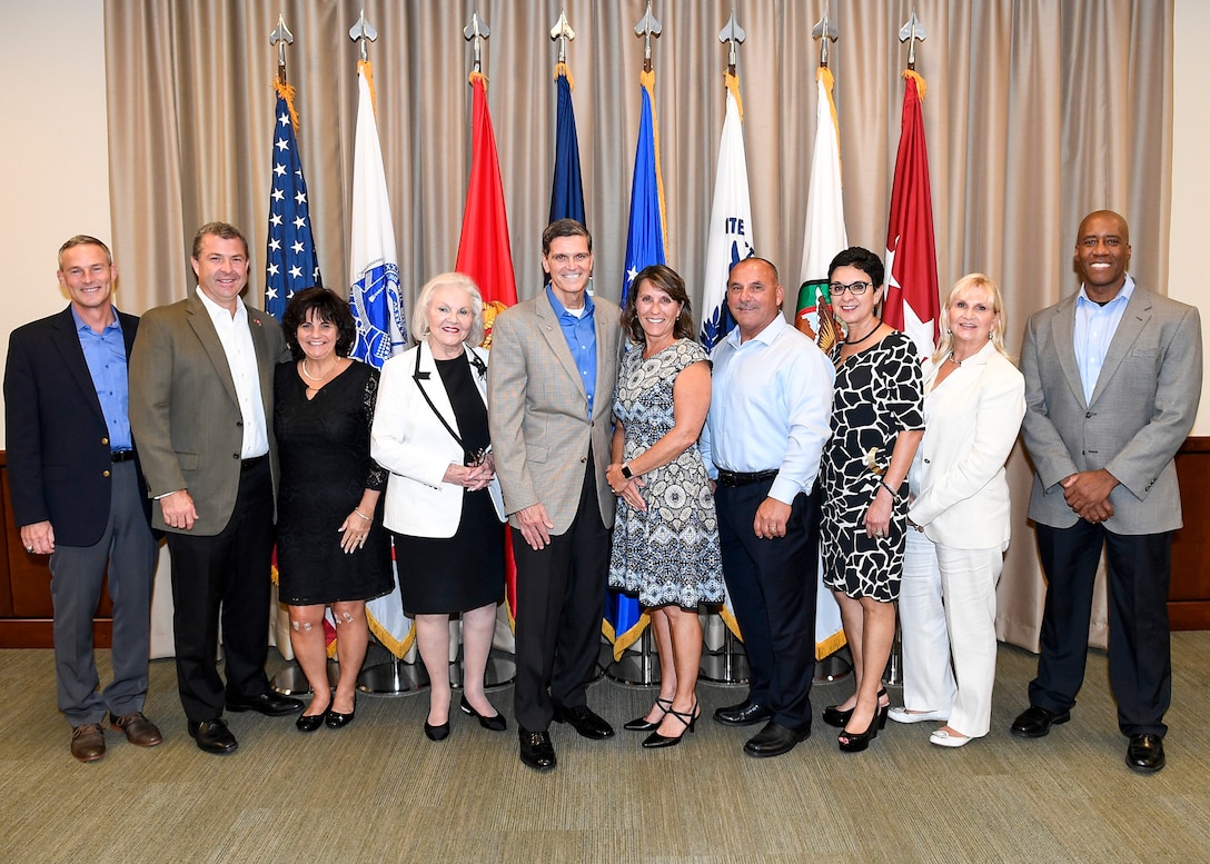 Senior officials from U.S. Central Command hosted civic leaders to a private dinner at the command’s headquarters, Aug. 2, 2018. The quarterly event is used to bridge the civilian-military divide by updating local business leader on USCENTCOM’s operations in Afghanistan, Iraq and Syria. Pictured (left to right): U.S. Air Force Maj. Gen. Jon Mott, USCENTCOM director of exercise and training; Brian Ford, Tampa Bay Buccaneers’ Chief Operating Officer and wife Judy Ford; Vivian Reeves, Reeves Import Motor Cars president and CEO; U.S. Army Gen. Joseph L. Votel, USCENTCOM commander, and wife Michelle Votel; Randal Collette and Yvette Segura, USAA Regional Vice President/General Manager; Kimberly Reeves-Rodgers, daughter of Vivian Reeves; and U.S. Marine Corps Maj. Gen. Michael Langley, USCENTCOM director of strategy, plans and policy.(U.S. Air Force photo by Tech Sgt. Dana Flamer/Released).