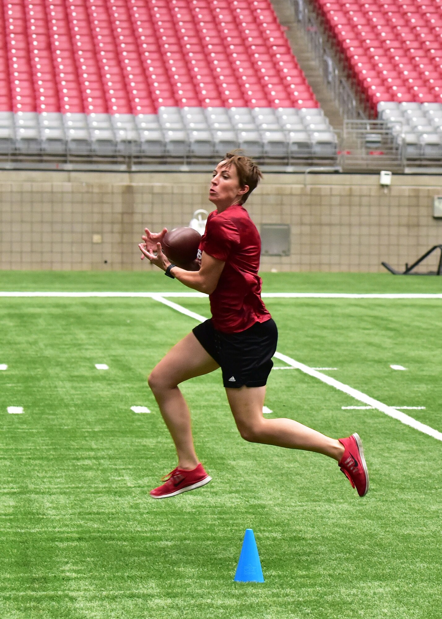 Service members from Luke Air Force Base participate in the 2018 Arizona Cardinals National Football League Boot-Camp experience at the University of Phoenix Stadium Aug 3.