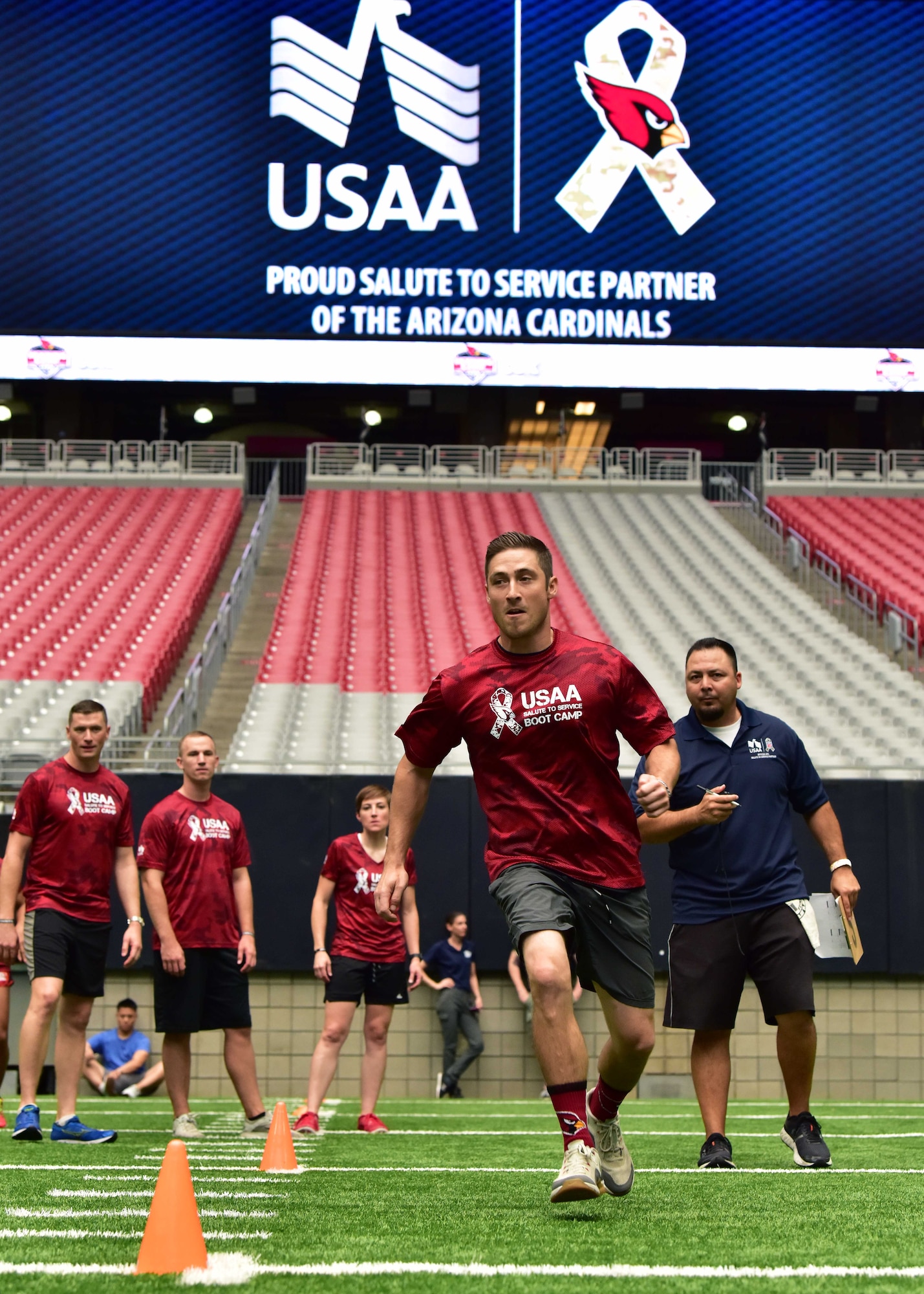 Service members from Luke Air Force Base participate in the 2018 Arizona Cardinals National Football League Boot-Camp experience at the University of Phoenix Stadium Aug 3.